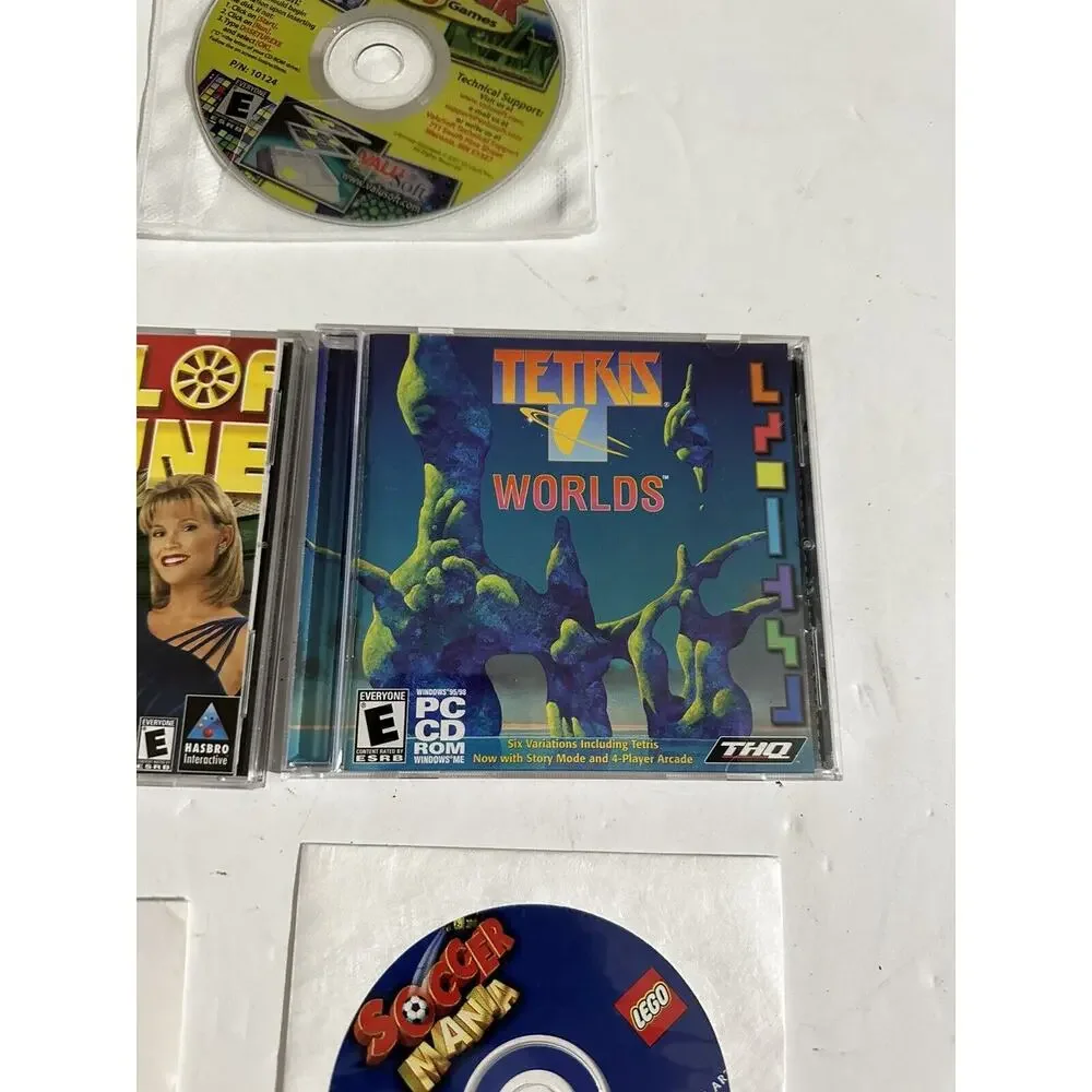 PC Game Lot 7 Gamepack 100 Monopoly Boggle Tetris Candyland Soccer Wheel Fortune